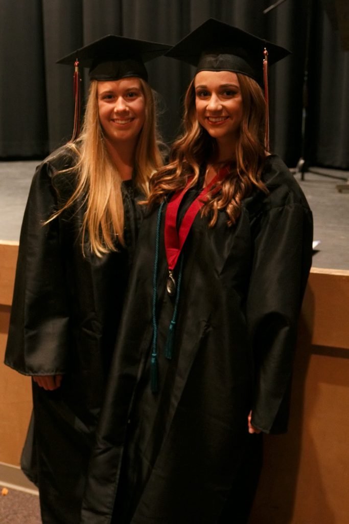 Torie Dawson (left) and Cassidy Bouchard (right) wore their gowns during the evening because they won't be able to attend graduation. Credit: Joel Mayorga/The Foothill Dragon Press