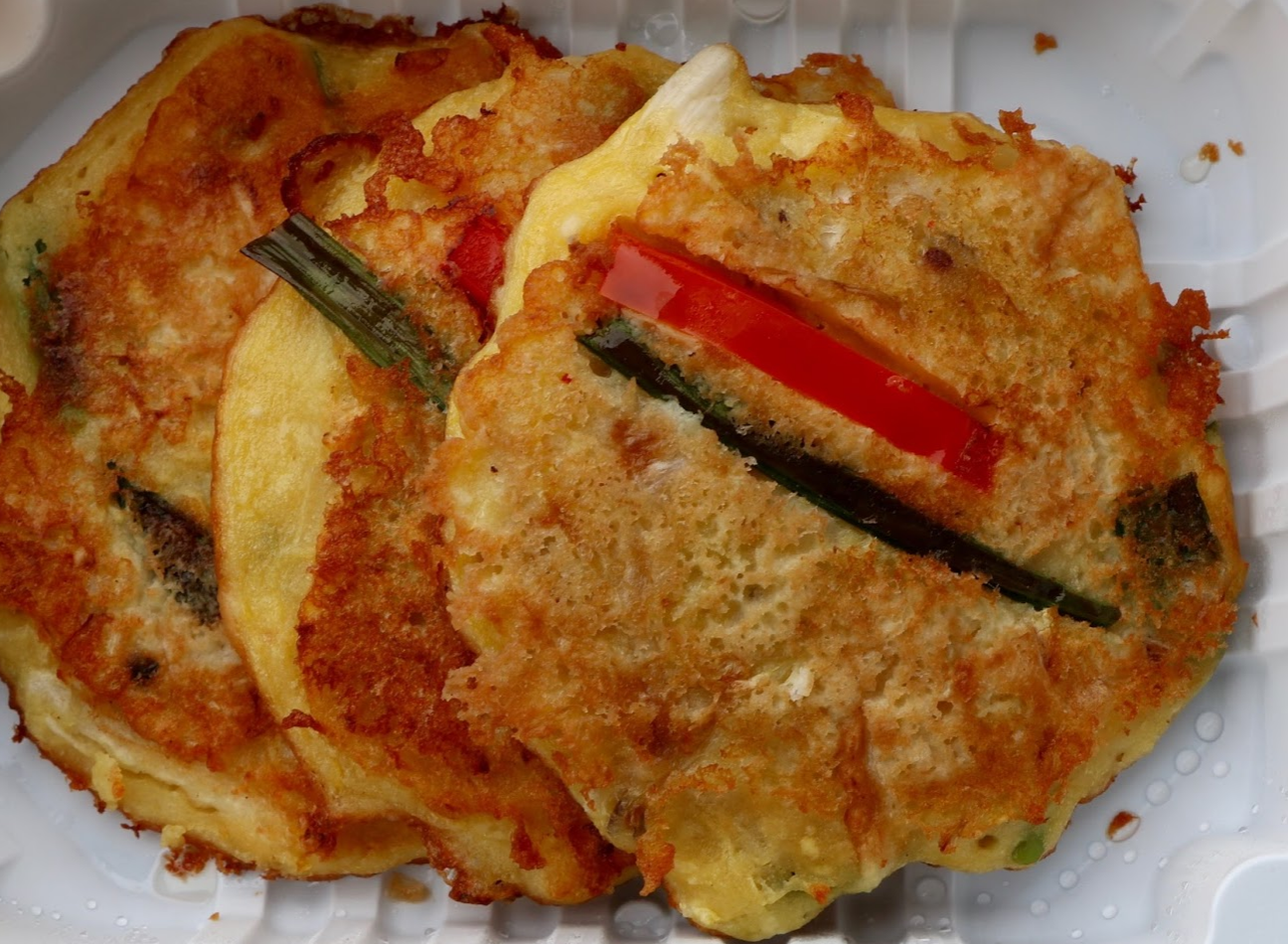 Bindaetteok is a pan fired mung bean pancake. Credit: Abigail Massar / The Foothill Dragon Press