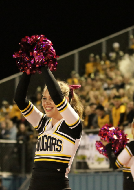 A Cougar cheerleader rallies for her team. Credit: Olivia Sanford / The Foothill Dragon Press