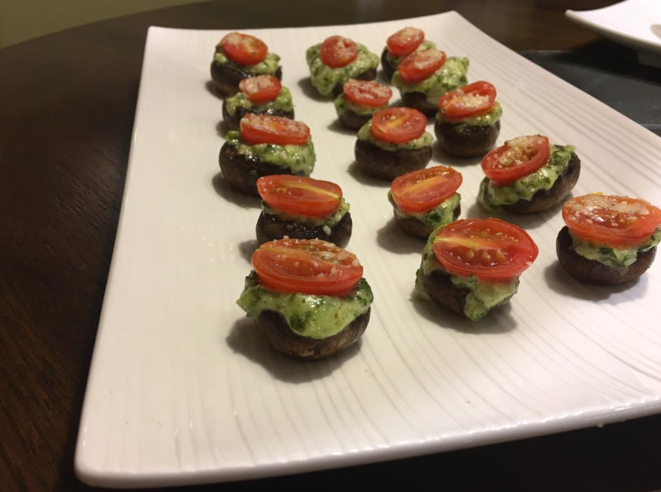 A perfect appetizer for any Thanksgiving celebration are these stuffed asiago-basil mushrooms that are sure to delight any person's taste buds. Credit: Emma Yakel / The Foothill Dragon Press