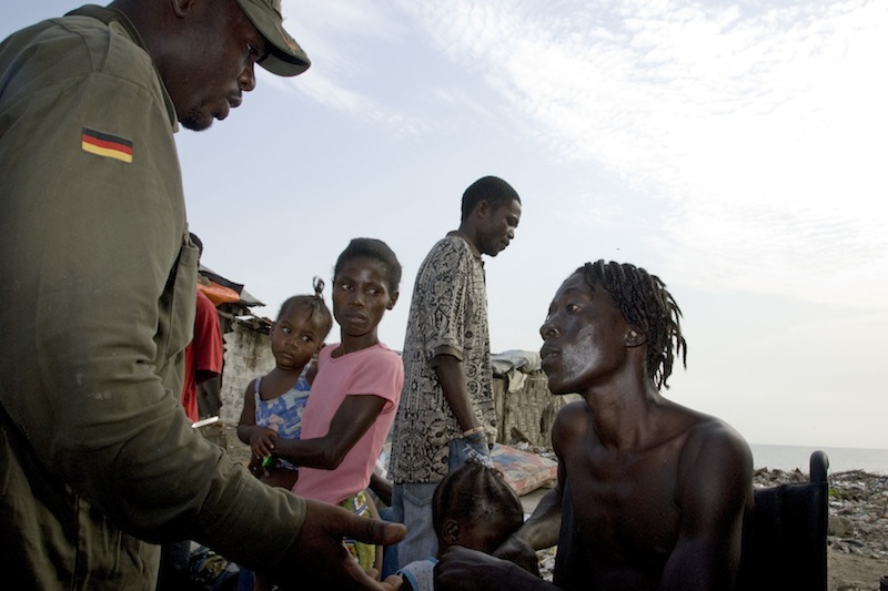 Joshua Milton Blahyi attempts to reconcile with one of his former child soldiers Credit: Ryan Lobo, used with permission of Daniele Anastasion and Eric Strauss.