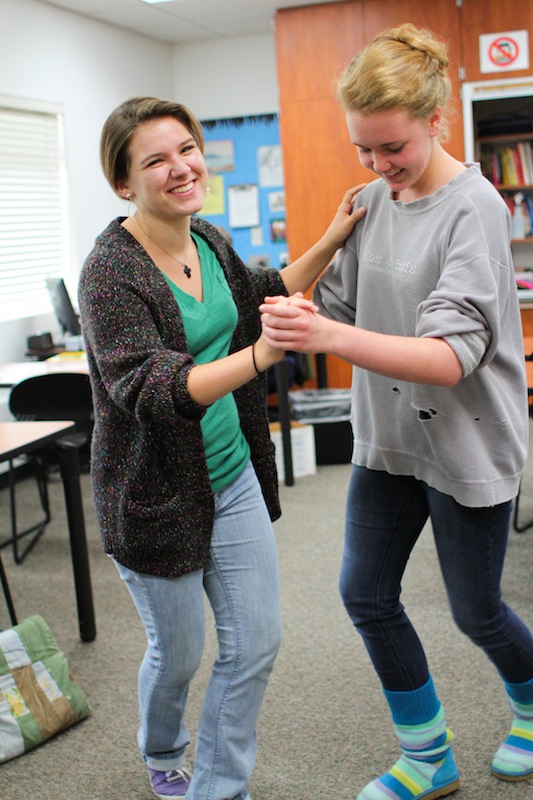 Junior Angela King and senior Bryn Gallagher dance together in the Swing Dance Club. Credit: Aysen Tan/The Foothill Dragon Press