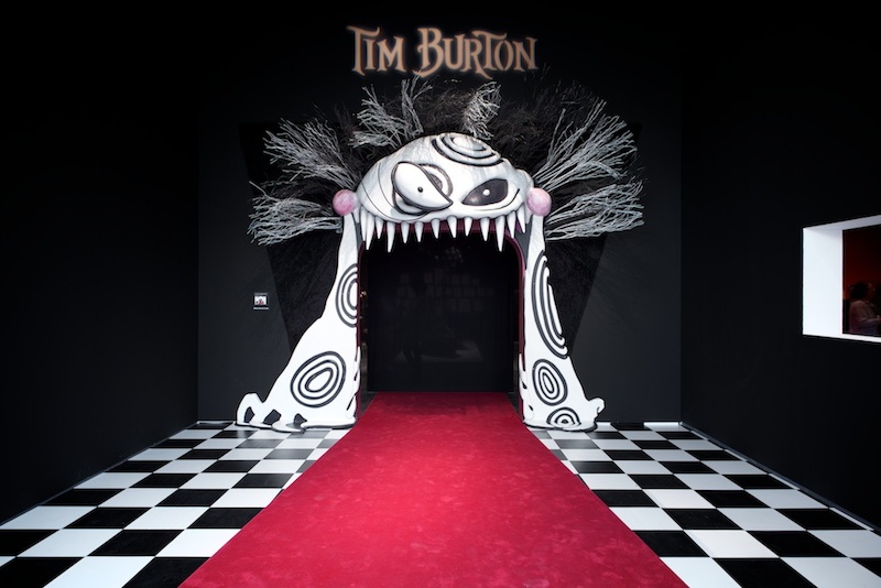 The open mouth of one of his characters serves as the entrance to Tim Burton's exhibit at the Los Angeles County Museum of Art. Creative Commons Photo by Flickr user brandon shigeta. 