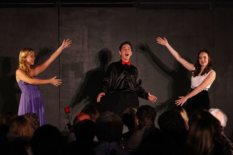 From left, Foothill senior Annabelle Warren, Ventura junior Jacob Mizraji, and Foothill senior Marnie Vaughan perform at the Company show choir dinner theatre. Credit: Bethany Fankhauser/The Foothill Dragon Press