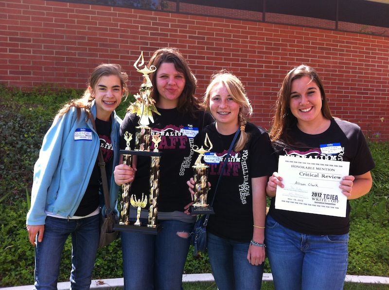 From left to right, sophomore Glenda Marshall, junior Rachel Crane, sophomore Kienna Kulzer, and sophomore Allison Clark competed at a competition held by the Tri-County Journalism Education Association Friday. Credit: Melissa Wantz. Used with permission.