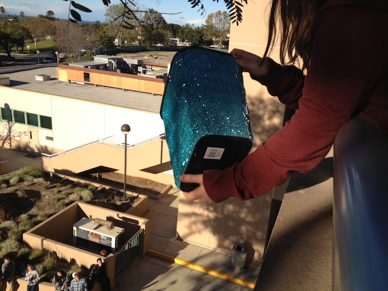 Junior Megan Witters prepares to drop her egg container off of the Science and Technologies building at Ventura College. Credit: Benjamin Limpich/The Foothill Dragon Press