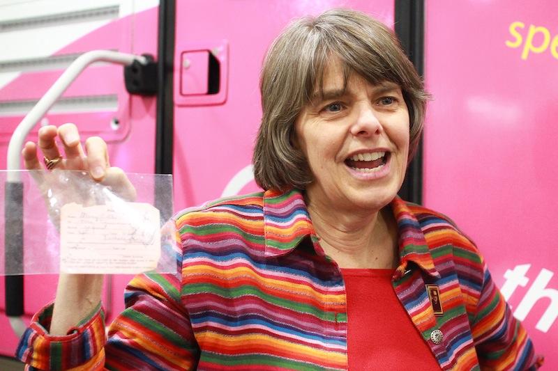 Mary Beth Tinker proudly holds the pink slip that summoned her to the office to be suspended for her black armband. Credit: Aysen Tan/The Foothill Dragon Press