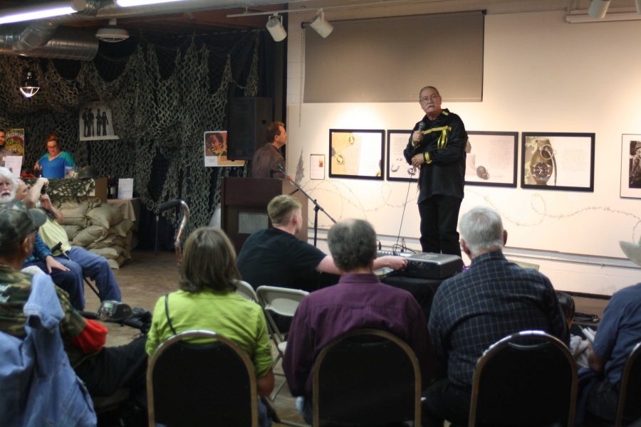 Local artist Moses Mora spoke at The Big Read and showed off some of his artwork. Credit: Bella Bobrow/The Foothill Dragon Press
