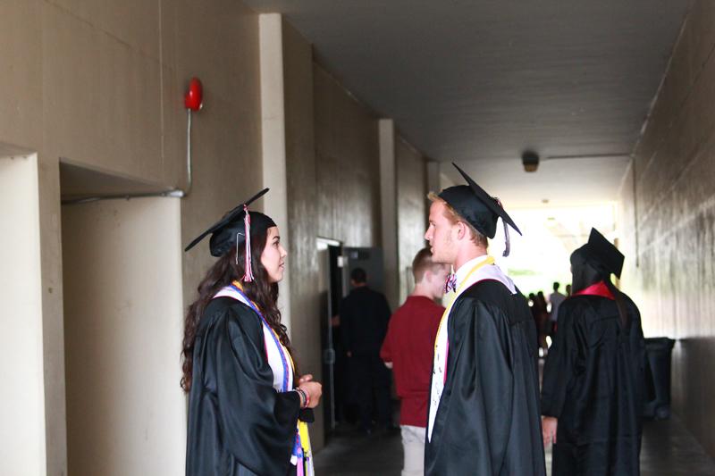 Seniors prepare to turn their tassels behind the scenes of graduation. Credit: Josh Ren/The Foothill Dragon Press