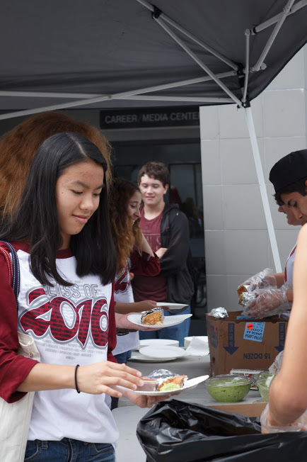 Senior Sachi Tan enjoys a Corrales burritos with other seniors before beginning team bonding activities. Credit: Julie Knowles/The Foothill Dragon Press
