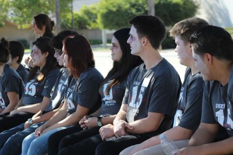 Senior Austin Shaw (third from the right) hopes that the simulation teaches students that anyone can be the victim of a driving while impaired accident. Credit: Rachel Horiuchi/The Foothill Dragon Press