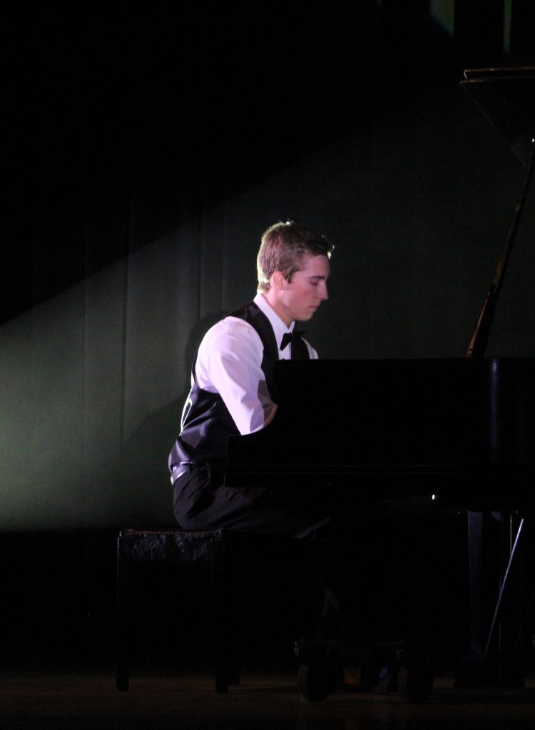 Foothill's Jerod Frederick, who has been playing piano for approximately 11 years, performed "Prelude in G Minor" by Rachmanioff Saturday night. Credit: Carrie Coonan/The Foothill Dragon Press
