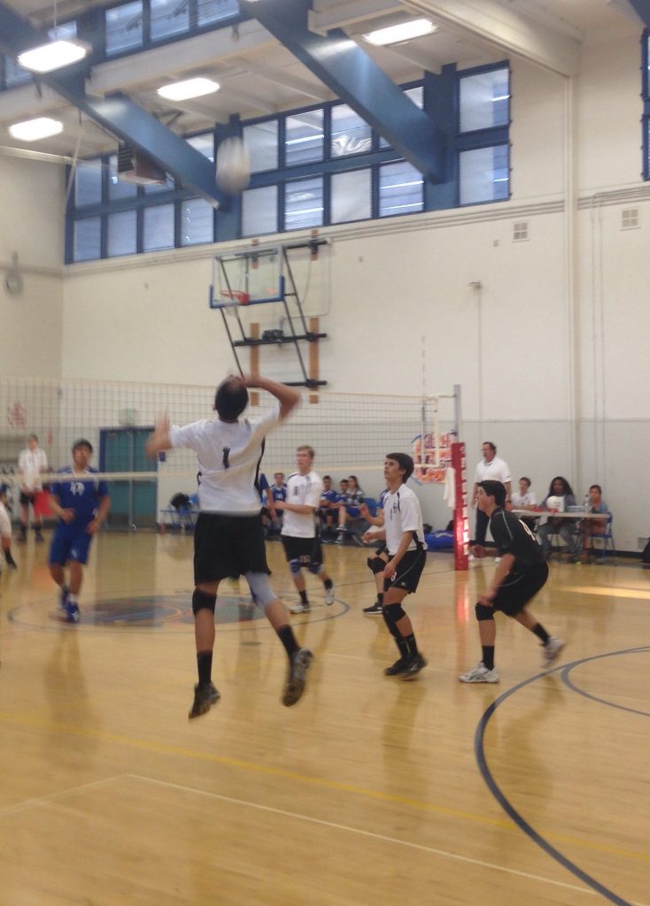 Sophomore Chad Talaugon jumps to spike the ball. Photo Credit: Chad Talaugon / The Foothill Dragon Press.