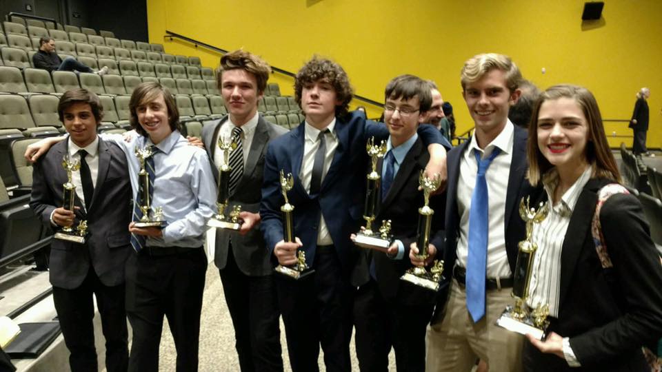 Debaters that won all three of their rounds. From right to left, 