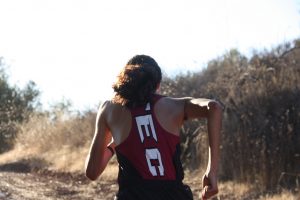 Alec Llamas '18 keeps his running form in the final steps uphill before a flatter plateau. Credit: Abby Sourwine / The Foothill Dragon Press