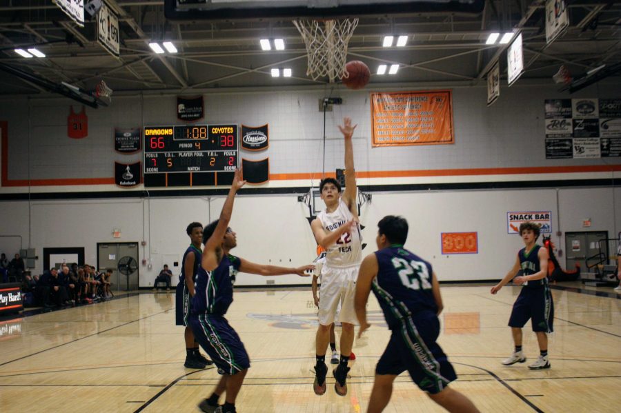 Sam Bova 19 jumps to make a two pointer.
Credit: Gabrialla Cockerell / Foothill Dragon Press