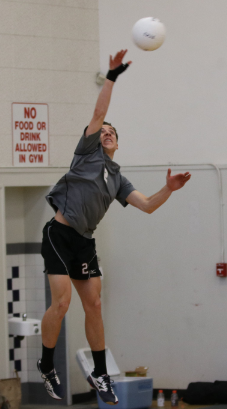 Dylan More '18 with a powerful jump serve. Credit: Olivia Sanford / The Foothill Dragon Press
