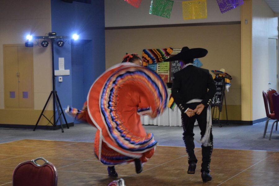 Maddie Espinoza ‘20 flows with the rhythm of the music while dancing ballet folklórico. Credit: Patricia Espinoza (used with permission)