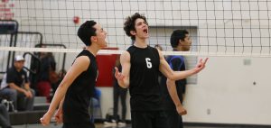 Matt Godfrey 20 and Chad Talaugon 18 get excited after a hard earned point. Credit: Olivia Sanford / The Foothill Dragon Press