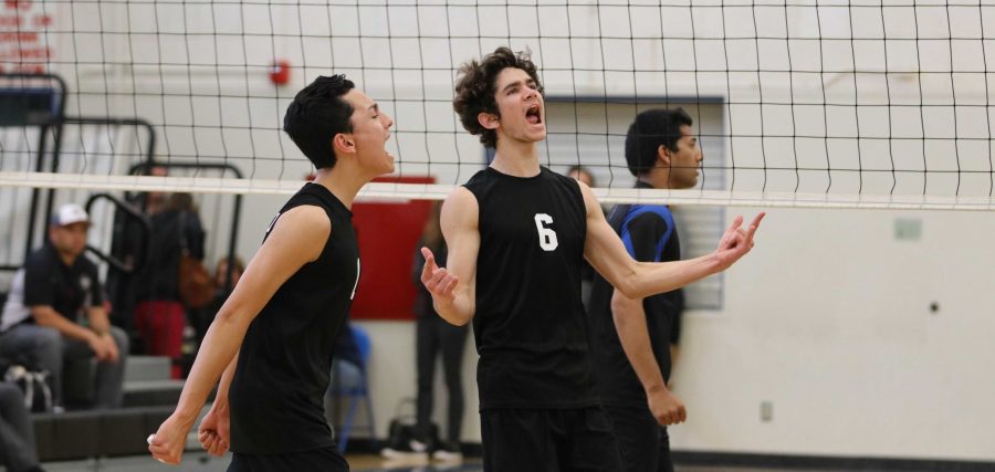 Matt Godfrey 20 and Chad Talaugon 18 get excited after a hard earned point. Credit: Olivia Sanford / The Foothill Dragon Press