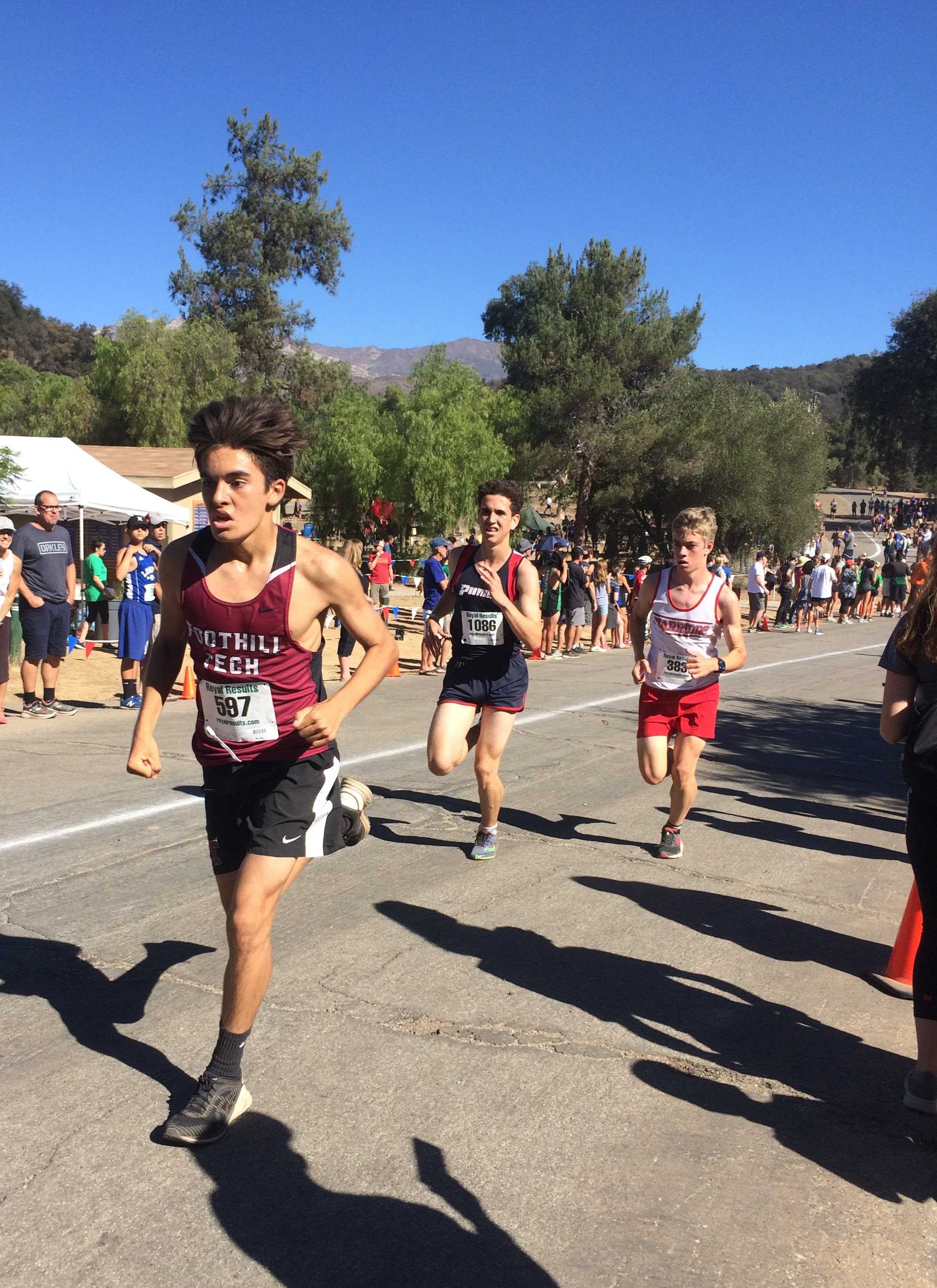 Josh Villasenor '21 pushing ahead of his competitors. Credit: Dylan Mullaney / The Foothill Dragon Press
