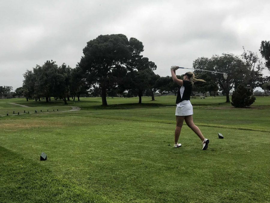 First swing for Paris White ‘19 on the first hole of the match. Credit: Katie Denger / The Foothill Dragon Press