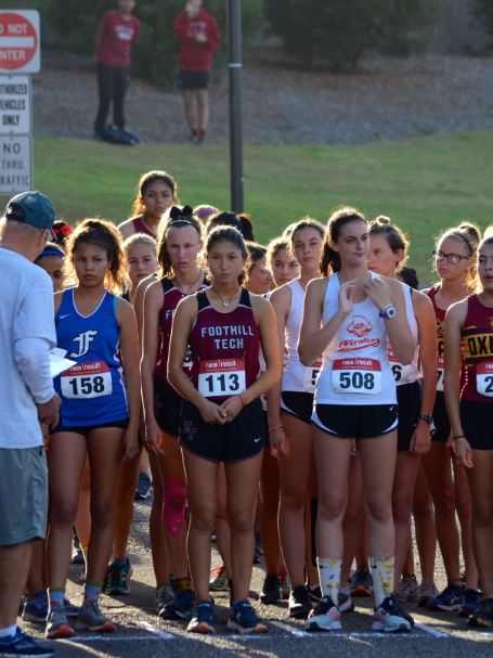 Runners line up at the start for the girls' three mile race. Credit: Jill Kinnaman (used with permission)