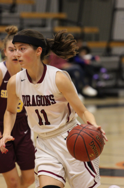 Abby Bova '19 dribbles rapidly towards the net. Credit: Ethan Crouch / The Foothill Dragon Press