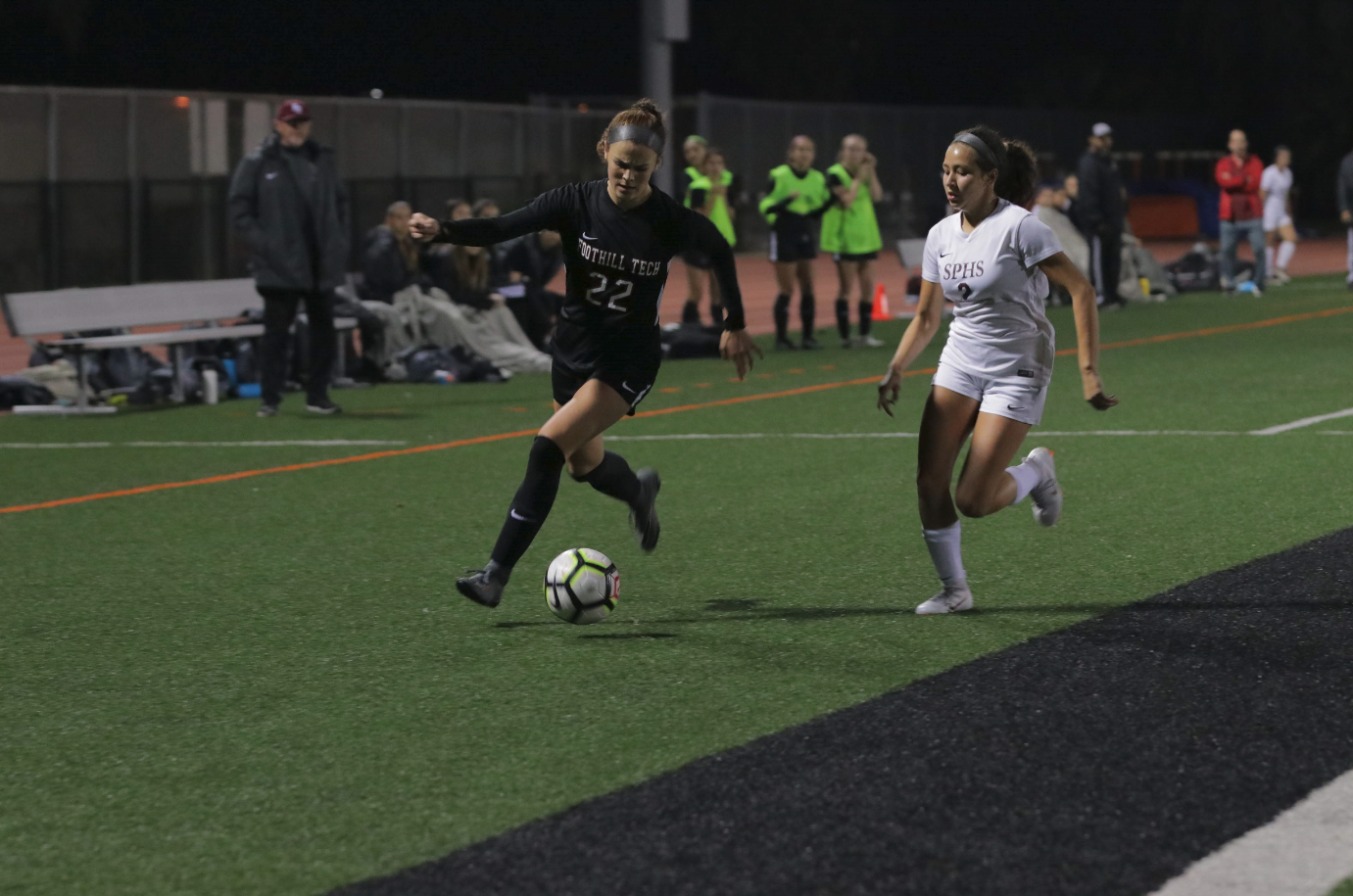 Grace Combs '20 sprinting down the field with the ball. Credit: Olivia Sanford / The Foothill Dragon Press