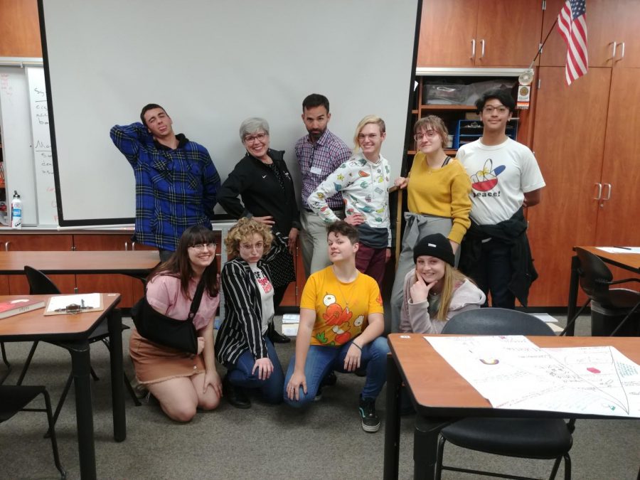 Queer-Straight Alliance Club pose for a picture with Career and