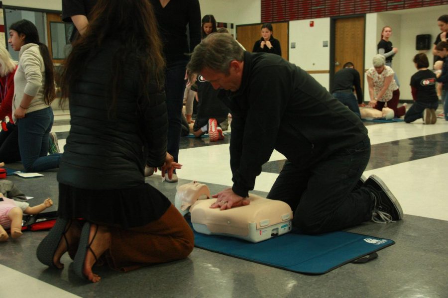 Foothill staff learning the procedures of CPR and use of AEDs.