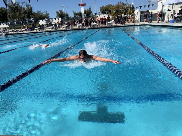 Jake Anders ‘20 swims strong during his butterfly event 