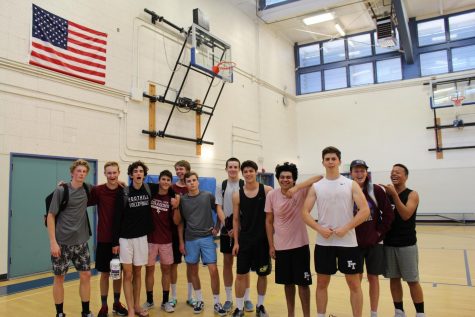 Sam Bova 19 with the varsity boys volleyball team of the Spring 2019 season. 