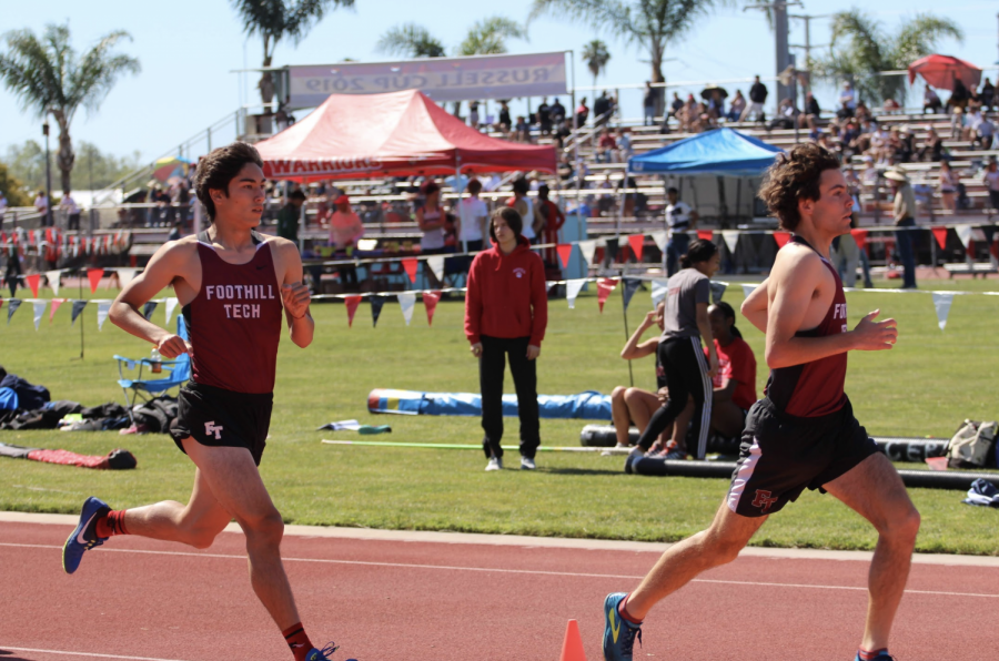 Henry Pick 19 and Jason Messner 19 push to the front during the one-mile race.