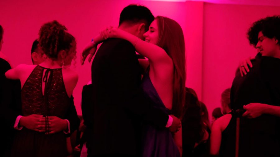 Noelle Basta 19 and Anson Tan 19 share a slow dance.