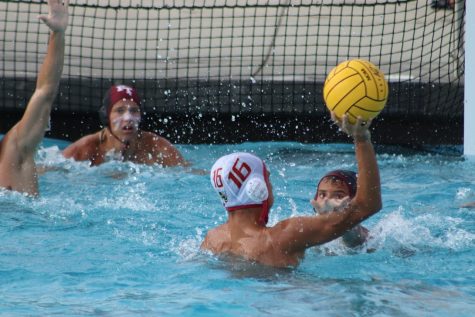 Max Canby 20 preparing to block a shot