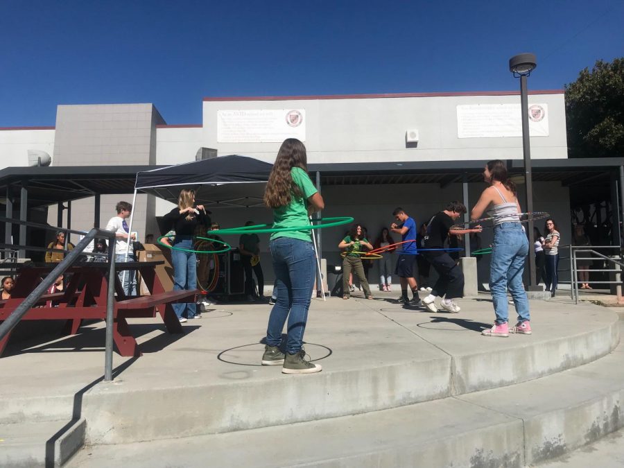 QSA hosts a hulu-hoop contest on the stage 