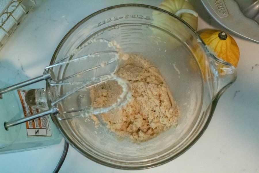Mix ½ cup of unsalted butter, ½ cup of granulated sugar and ⅓ cup of brown sugar on medium speed with a hand mixer