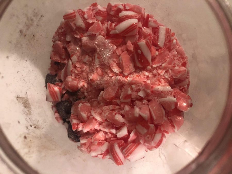 Put candy canes on top of the layer of chocolate chips.