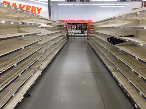 Grocery store shelves in Ventura are emptied by shoppers due to COVID-19 panic.