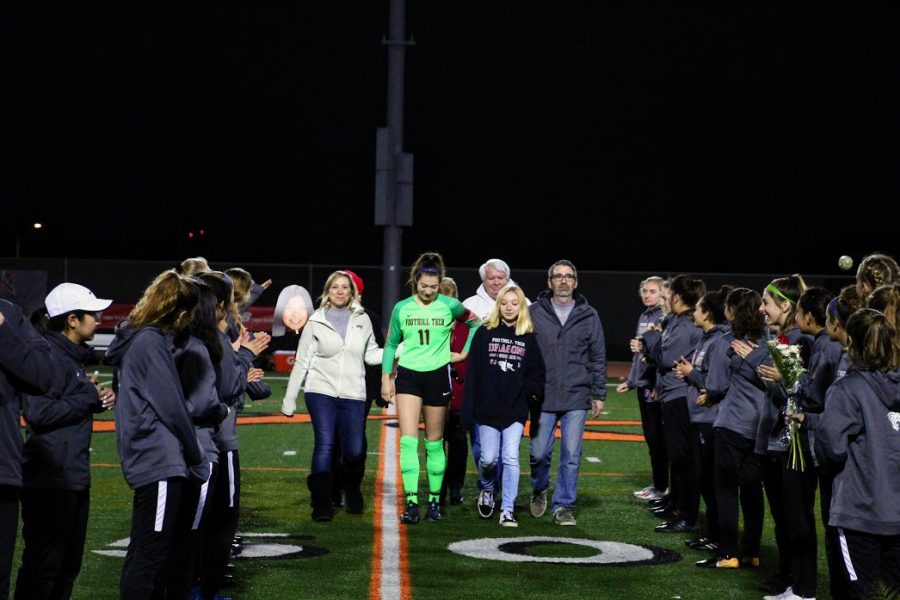 Keara+Fitzgerald+20+and+her+family+celebrate+Senior+Night+with+the+Foothill+girls+soccer+team.++Spring+season+athletes+do+not+get+to+celebrate+these+events+in+face+of+COVID-19.+