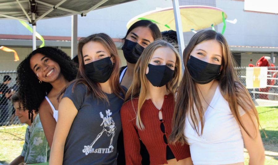 Foothill Tech freshmen wait in line to get their faces painted.