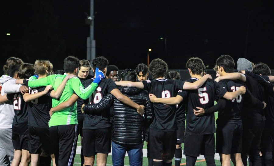 The+Foothill+Tech+boys+varsity+soccer+team+huddle+up+on+senior+night+to+prepare+for+the+game.+The+atmosphere+is+excited+yet+tinged+with+sadness+for+the+seniors+last+soccer+season.