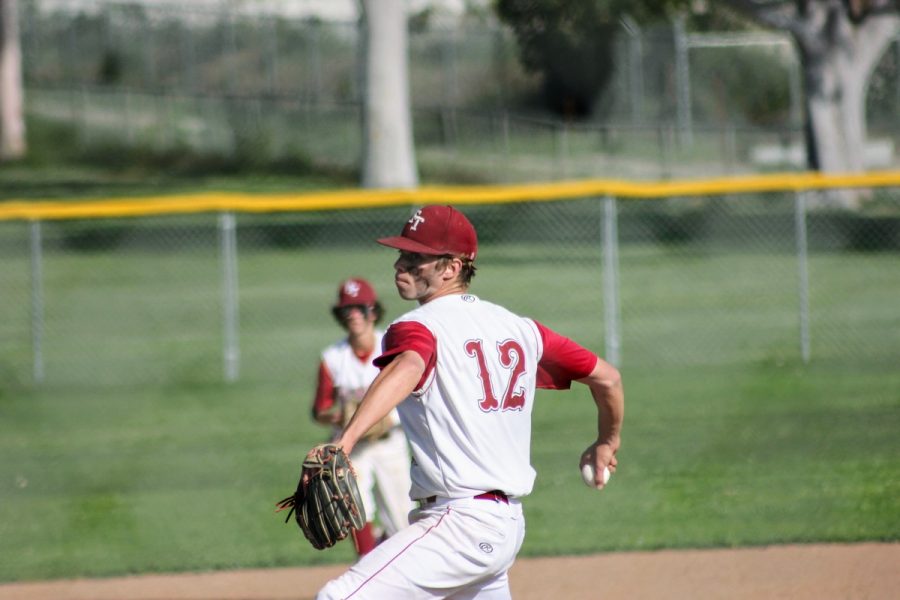 Xander Belchere 22 winds up his pitch to strike out a Santa Clara batter.
