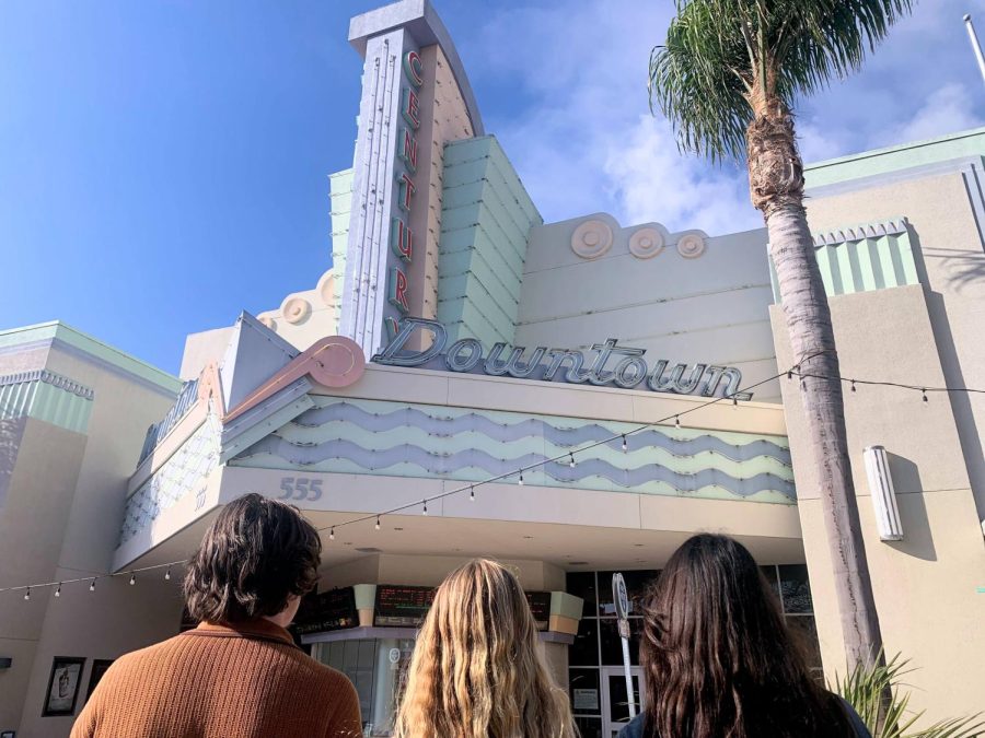 Foothill+Technology+High+School+students+Anna+English+24%2C+Miles+Baker+23+and+Katelyn+Neasham+24+gazing+at+the+showtimes+at+Century+Theaters+in+downtown+Ventura.