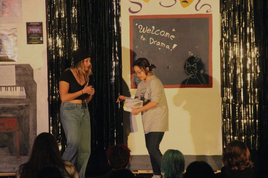 Clarisse Cortez 23 and Avery Buehner read their funny skit aloud, leaving the audience very entertained.