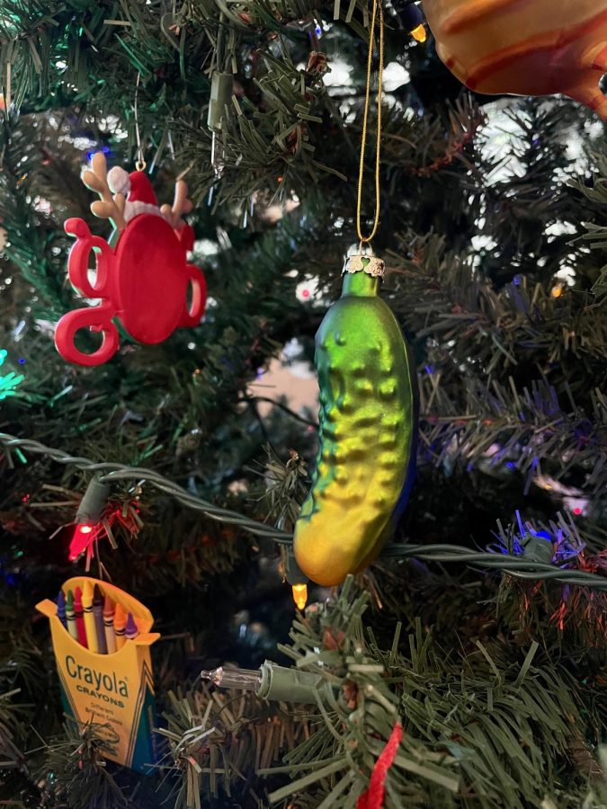This pickle ornament tradition described by Emily Falls ‘25 was a charming experience and lots of fun. Hunting for it seemed to be more of a challenge than originally anticipated as it was tucked within the similarly colored leaves of the Christmas tree, but searching high and low for this shiny ornament made the experience very interactive. 