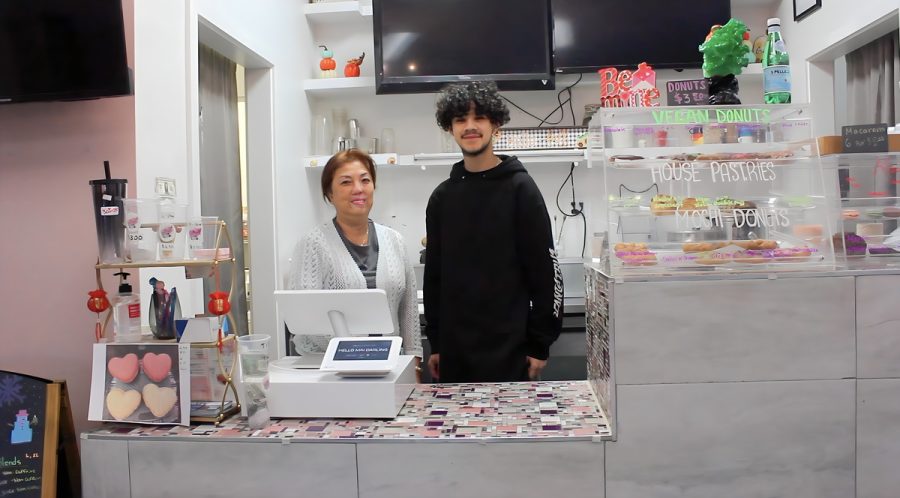The owner of Hello Mai Darling and an employee greet customers with a smile.