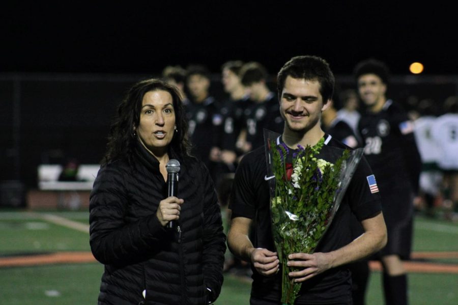 Number 10 Alex Edwards 24 laughs as his mom recalls memories from his soccer career. She expresses how proud she is of her son.