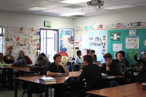 Third period AP Psychology students talk amongst themselves at the end of a tiring period of presenting about human development.